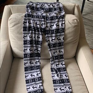 White and black leggings with dears.